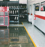 service bay with safety striping, walkway and clear coat